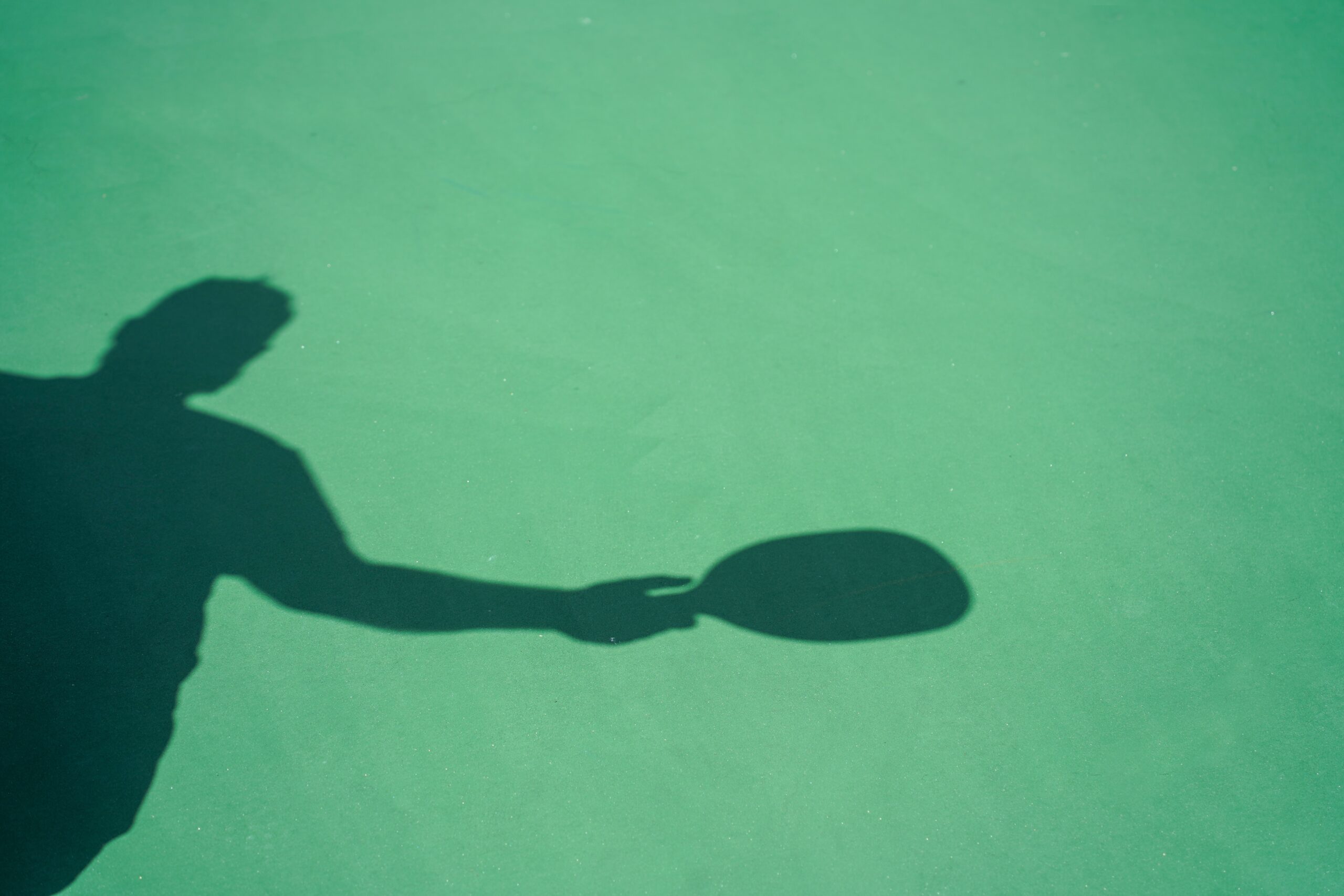 Silhouette,Outline,Of,A,Man,Playing,Pickleball.